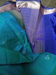 Elegant Teal Saree with Silver Zari Border