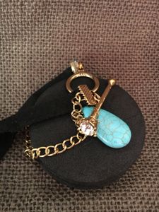 Turquoise and leather band bracelet
