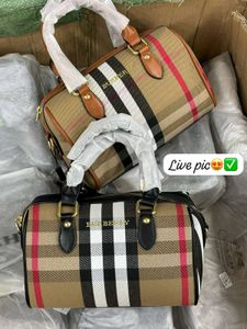 IMPORTED BURBERRY DUFFLE TYPE SLING WITHOUT BOX