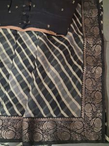 Elegant Striped Saree with stitched  Blouse
