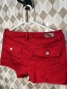 Red shorts with embroidered heart, very Y2K