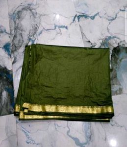 Elegant Green Saree with Gold Border
