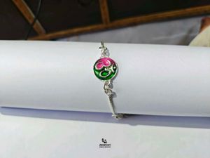 Elegant Enamel Pure Silver Rakhi