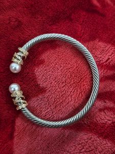 Stylish Twisted Bangle with Pearls