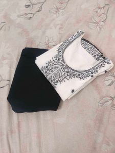 White Embroidered Kurta with Black Leggings