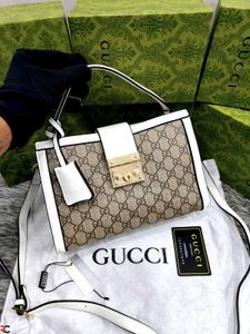 GUCCI* *PADLOCK BAG FEATURING THE ICONIC GG