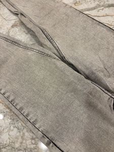 grey jeans