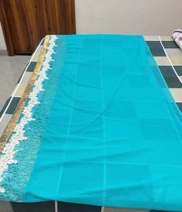 Beautiful Teal Blue Saree with Gold Border