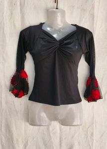 I. Stylish Black Top with Bell Sleeves