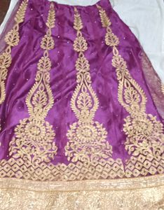 Elegant Purple Saree with Gold Embroidery