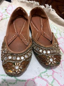 Embellished golden traditional Juttis