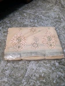 Elegant Cream Embroidered Saree