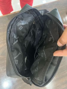 Victoria cross leather bag