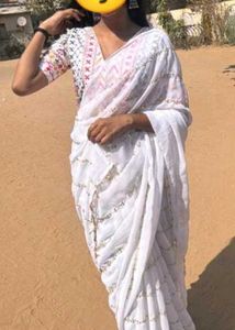 Elegant White Saree with Golden Embellishments