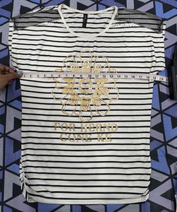 Chic Striped Top with Embellished Flower