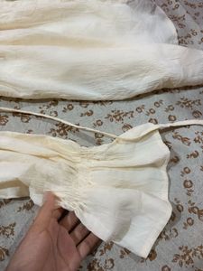 Ruffle Dress ( it has a tie in the back)