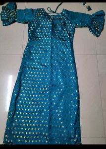 Elegant Teal Gown with Golden Print