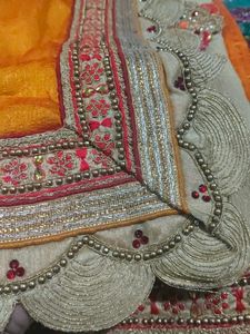 Stunning Orange Embroidered Saree