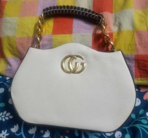 Chic White Handbag with Gold Accents