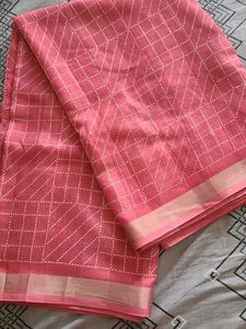 Elegant Pink Saree with White Diamond Pattern