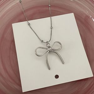 Chic Silver Bow Pendant Necklace