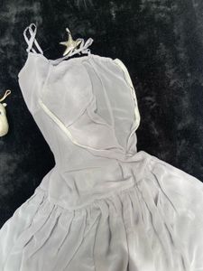 Sheer Strappy Mini Dress.