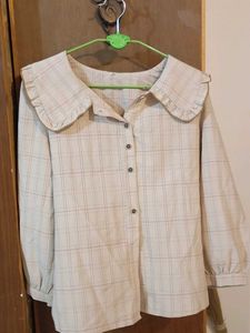 Chic Plaid Blouse with Ruffle Collar