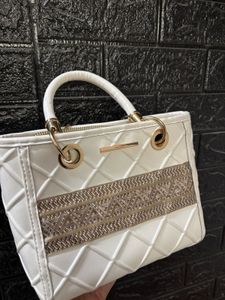 Chic White Quilted Handbag with Embellishments