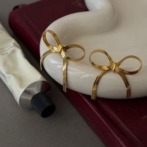 Elegant Gold Bow Earrings