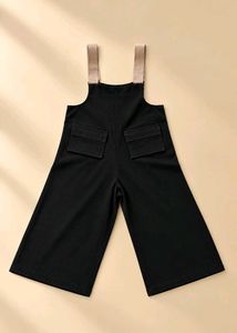 BLACK RIBBED WIDE-LEG DUNGAREES WITH BEIGE STRAPS