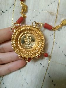 Elegant Gold Chain with Red Beads
