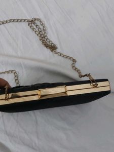 Elegant Black Clutch with Gold Chain