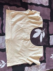 pastel yellow button-down crop top blouse.