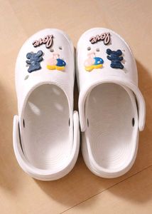 cute white clogs with charms