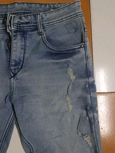 Light Wash Distressed Denim Jeans