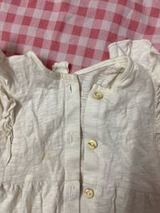 Cream Ruffle Sleeve Romper