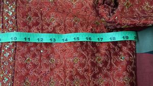 SHERWANI 36 SIZE RED COLOUR WITH HEAVY WORK IN IT FOR GRAND FUNCTIONS AND PARTIES READY TO USE CONDITION