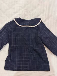 Peter Pan collar windowpane grid blouse.