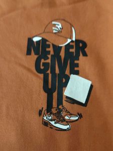 Orange Graphic T-Shirt and black pant