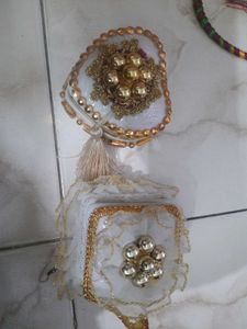 Elegant Kundan Embellished Potli Bag