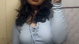 Light Blue Lace-Up Knit Top