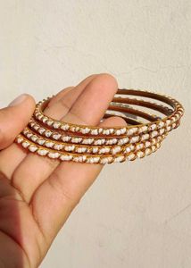 Elegant White Beaded Gold Bangles Set