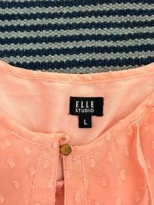 Chic Peach Ruffle Top