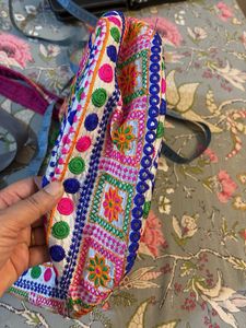 Embroidered Hobo Bag with Tassels