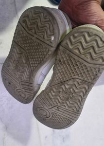 Worn White Sneakers