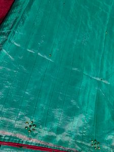Beautiful Teal Saree with Red Border