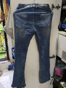 Distressed Flare Jeans