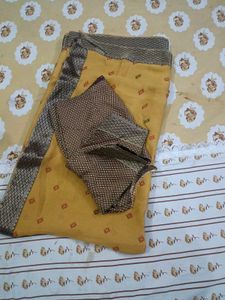 Elegant Yellow Saree with Contrasting Blouse