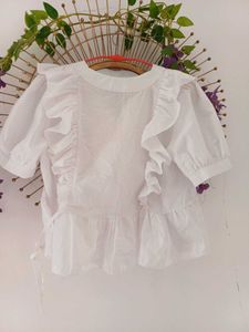 Elegant White Ruffled Peplum Top