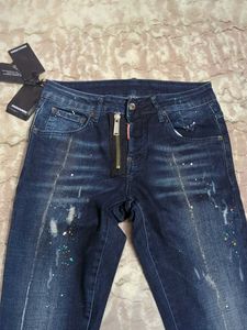 Stylish Dark Wash Jeans with Unique Embellishments